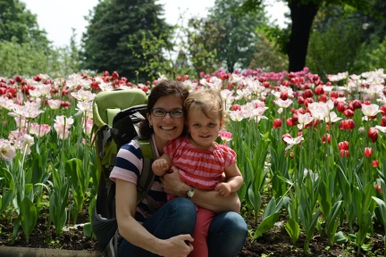 Erynn and Greta posing by the tulips